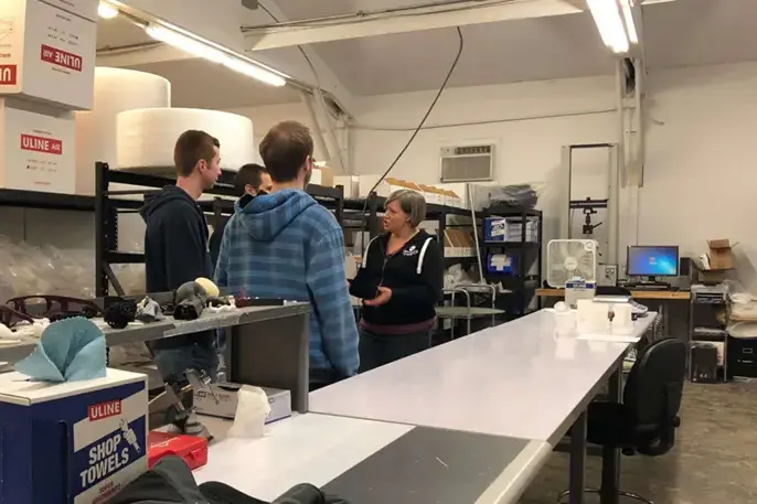 The PCC students review the parts and grill Chantelle with questions.